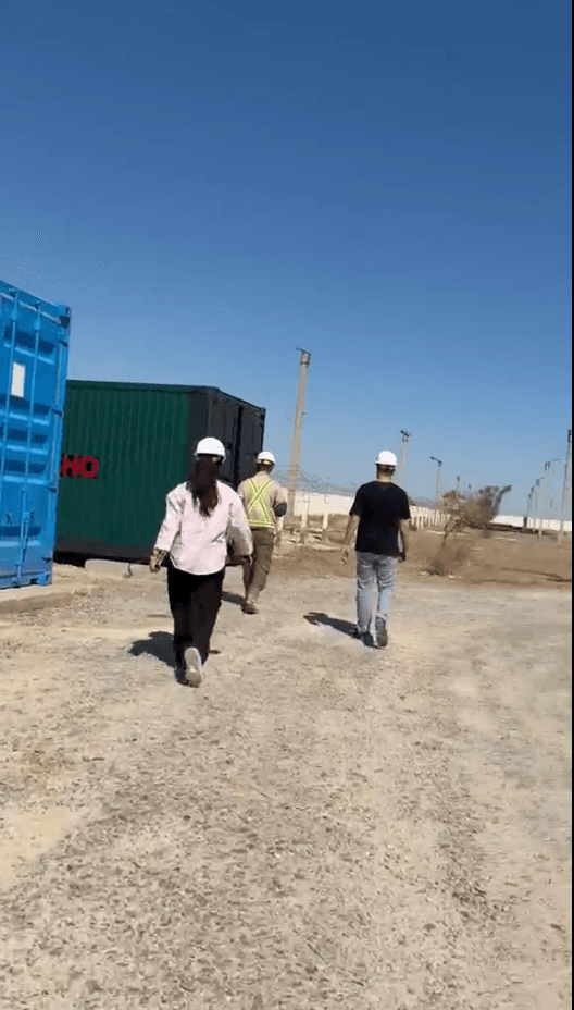 Condor Energies site visit — field team walking the yard